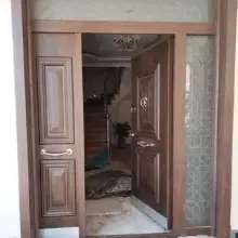 very wide 8 feet luxury double panel door  with glass on both sides and at the top installed in Runda estate in Kenya