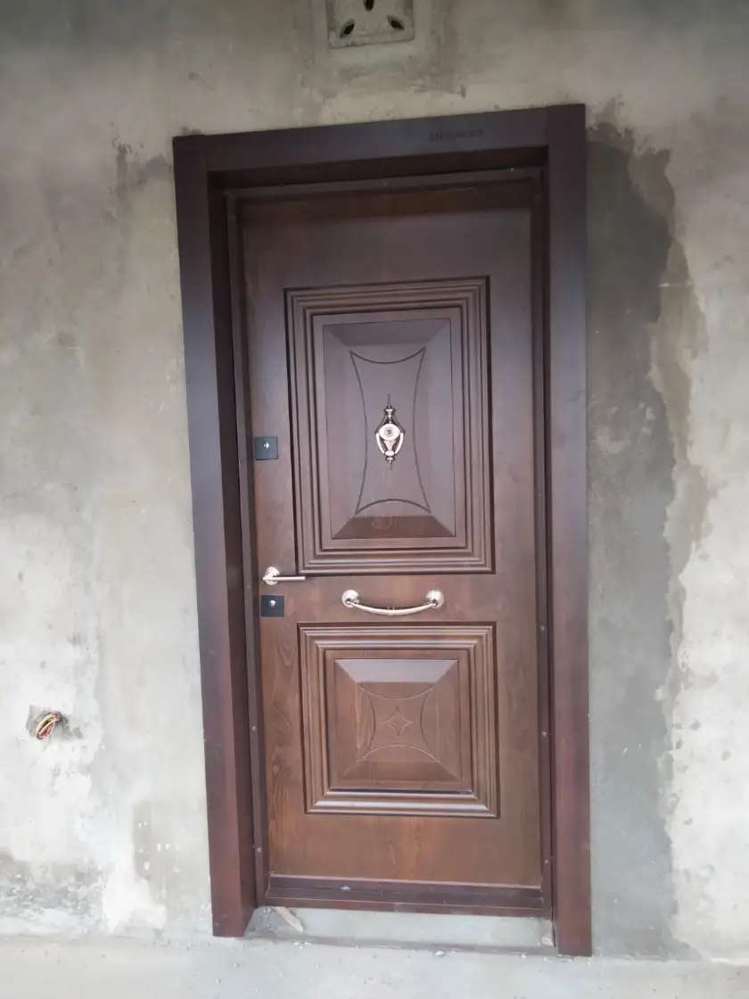 very wide 8 feet luxury double panel door  with glass on both sides and at the top installed in Runda estate in Kenya